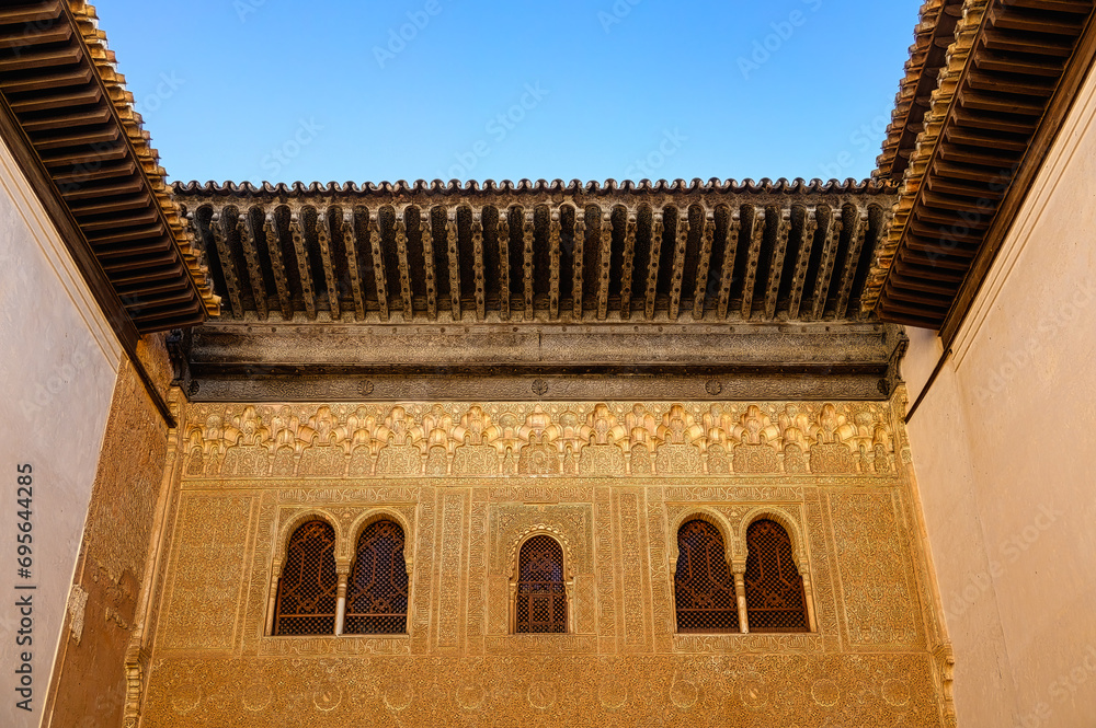 Wall in courtyard. Medieval Islamic style architecture in Alhambra, Granada, Spain
