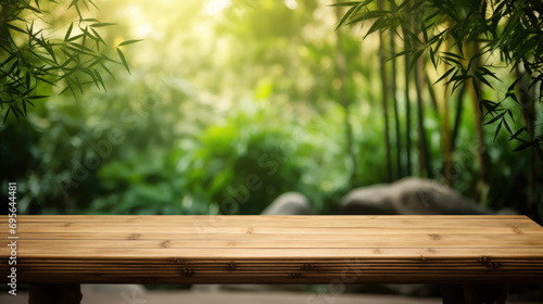 Empty Old Bamboo Table with Blurred Garden Theme in Background, Perfect for Product Display.