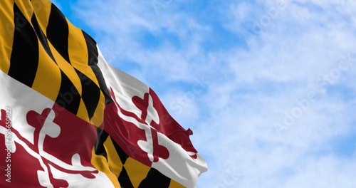 Maryland state flag waving on a clear day