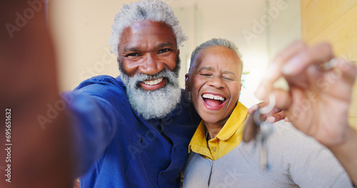 Senior couple, selfie and keys at front door, new home or excited with pride, care or moving. African woman, man and happy together for portrait, love or investment in property, real estate or house photo