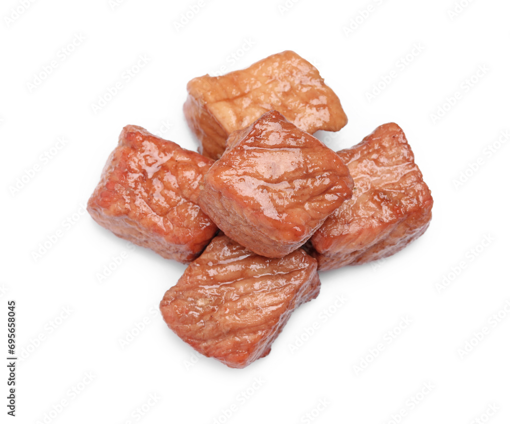 Pieces of delicious cooked beef isolated on white, above view. Tasty goulash Pieces of delicious cooked beef isolated on white, above view. Tasty goulash