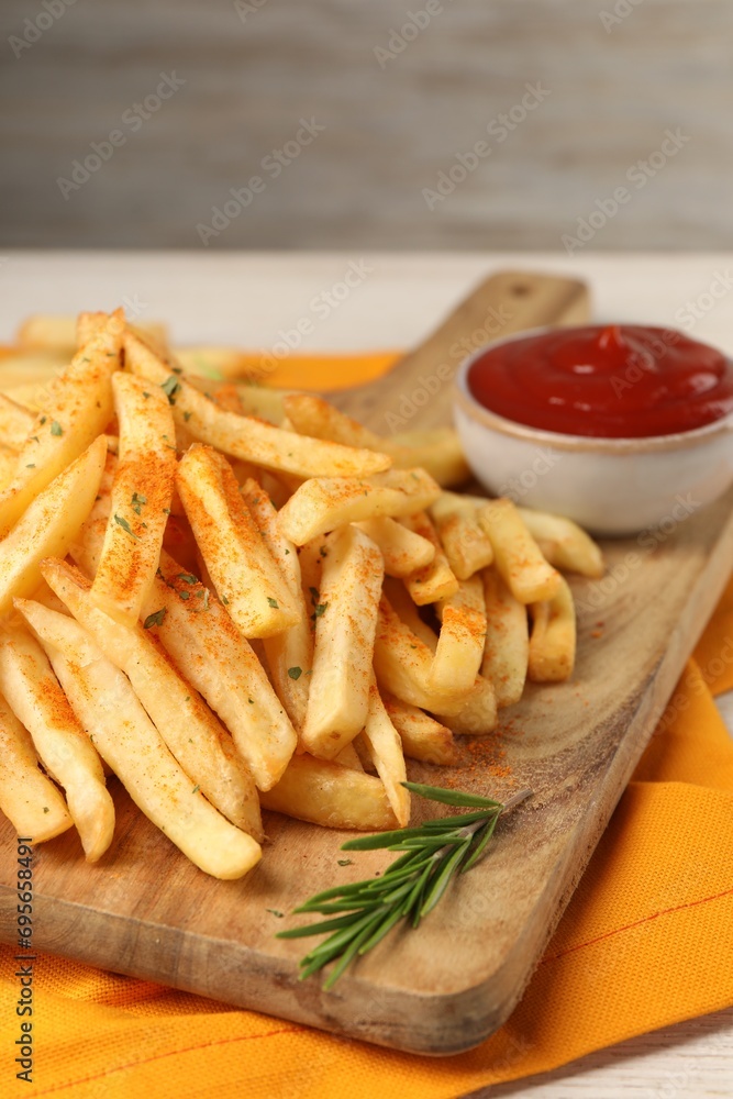 Delicious french fries served with sauce on white wooden table, closeup Delicious french fries served with sauce on white wooden table, closeup