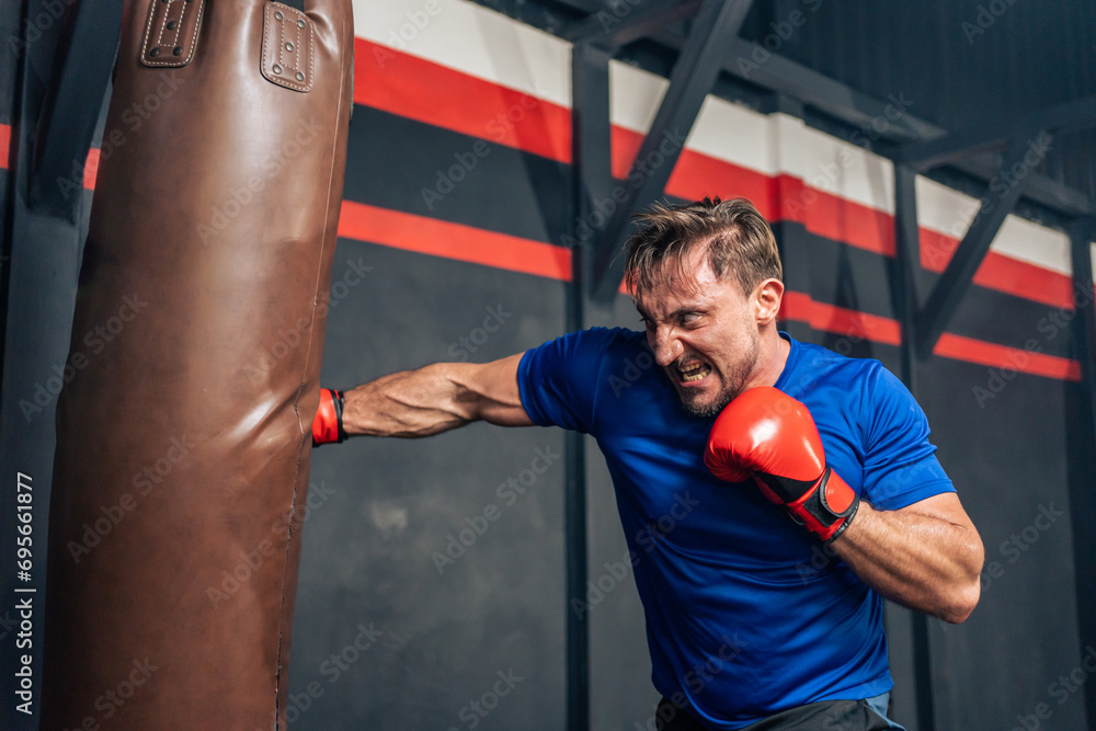 Young Caucasian professional sport young man exercising in fitness. 