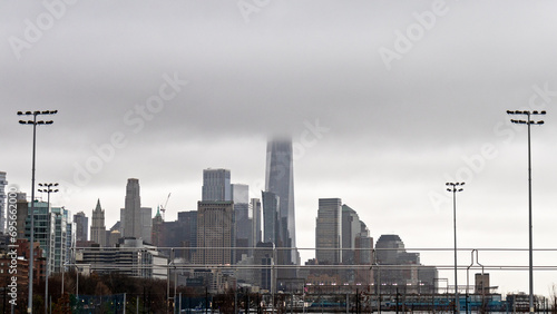 city skyscrapers in the fog