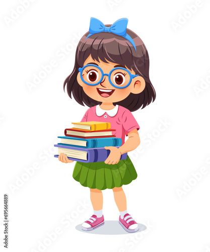 Cute little girl standing and holding a pile of books. She has joyful expression and smile