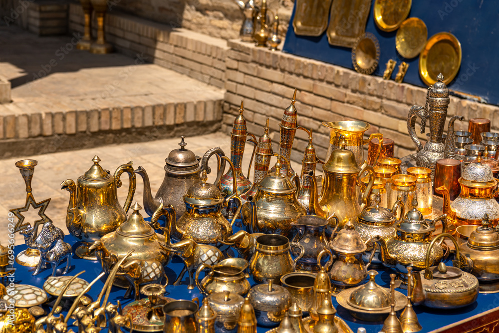 Copper teapots and cups in the Old Town of Bukhara, Uzbekistan Copper teapots and cups in the Old Town of Bukhara, Uzbekistan