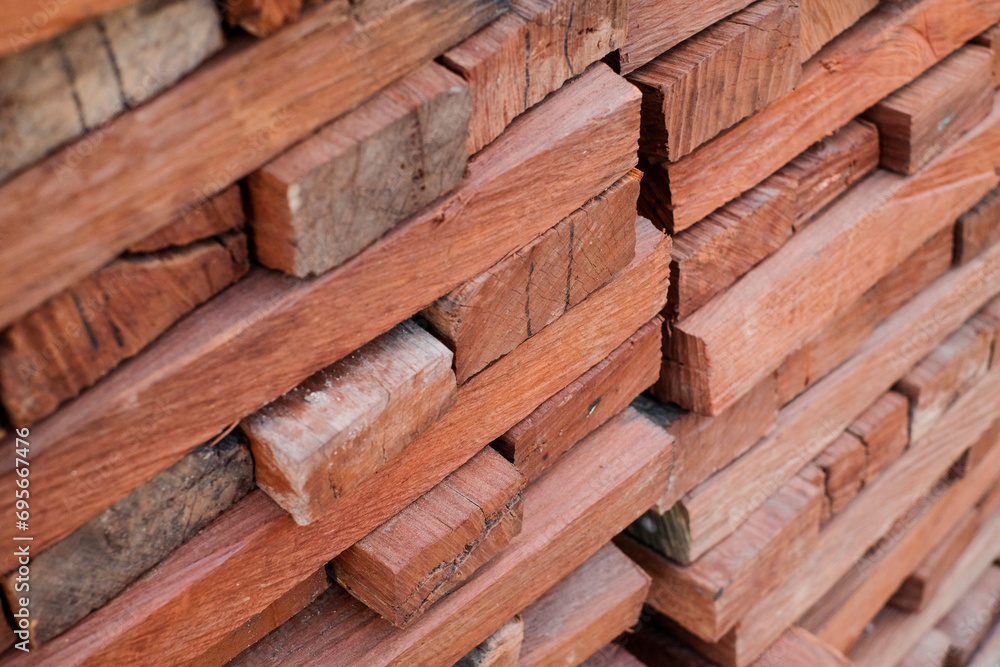 Skilled Hands at Work: Elegant Transformation of Ulin Wood into High-Quality Building Material Skilled Hands at Work: Elegant Transformation of Ulin Wood into High-Quality Building Material