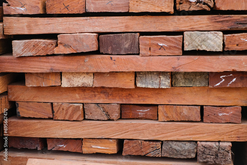 Skilled Hands at Work: Elegant Transformation of Ulin Wood into High-Quality Building Material