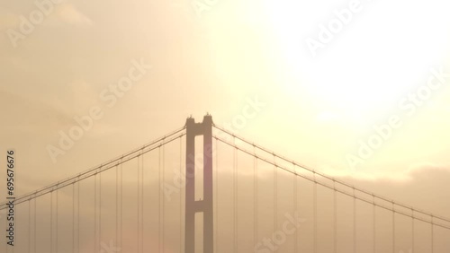 薄曇りの朝の太陽と白鳥大橋のシルエット	
 photo
