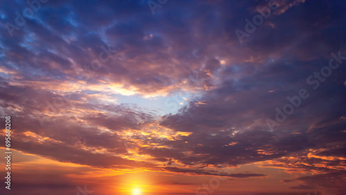 Colorful cloudy sky at sunset. Gradient color. Sky texture, abstract nature background. Pink sky on a summer morning or evening. photo
