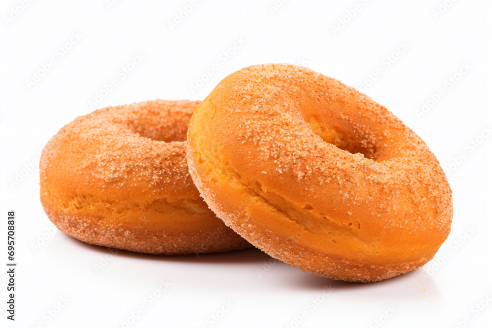 two sugar covered donuts on a white surface two sugar covered donuts on a white surface