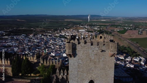 Tower and flag of Almodobar del Río Castle, Drone shot 4k, cordoba photo