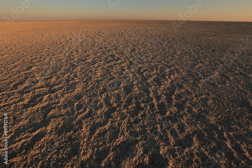 sunset light at the empty Makgadikgadi salt flat Botswana