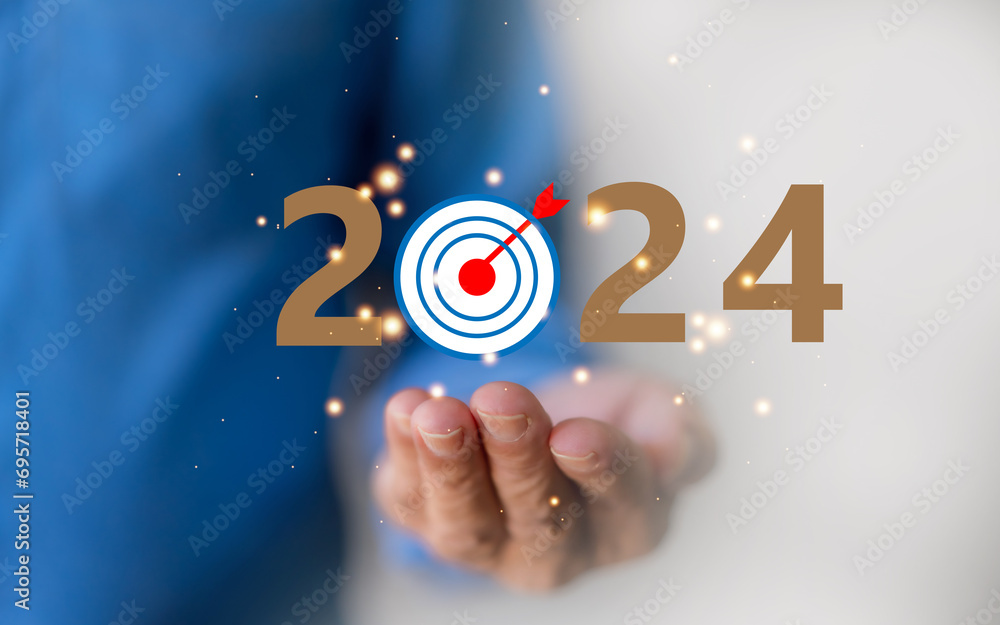 Human holding on 2024 new year wording for marketing and business planing, action plan for success growth, trend on 2024 and new ideas, startup, technology, new business plan and development Human holding on 2024 new year wording for marketing and business planing, action plan for success growth, trend on 2024 and new ideas, startup, technology, new business plan and development