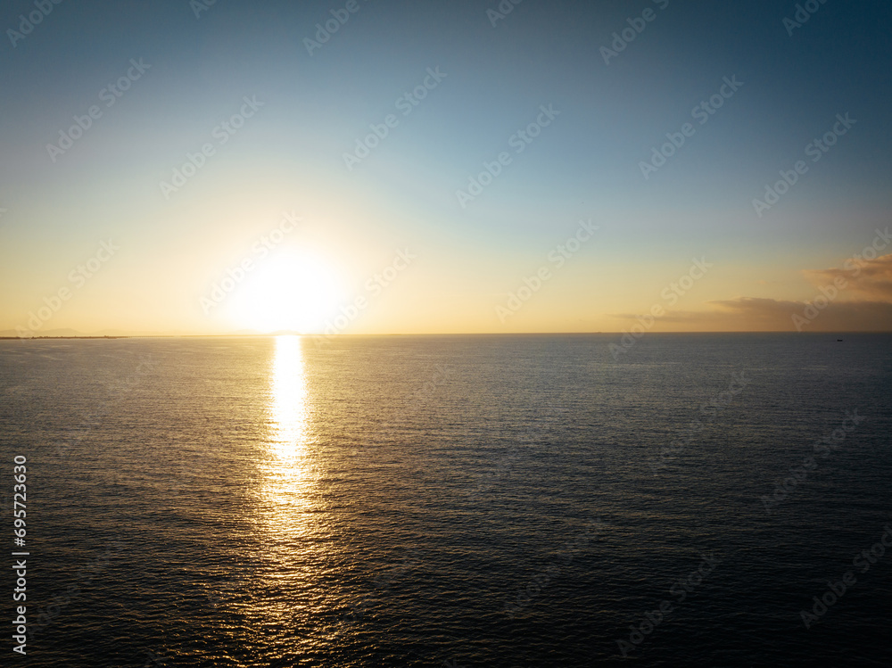 Obraz premium Aerial view of beautiful sea wave and sunrise sky