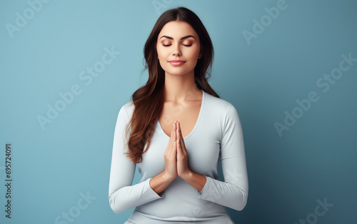 young indian woman praying