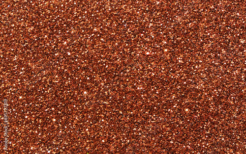Golden red brown glitter bokeh sparkling light shining background. Christmas, New Year, Valentine, Anniversary and Celebration backgrounds concepts.  © Maliflower73