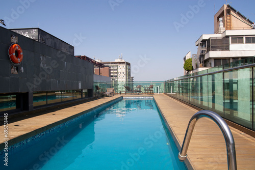 Porto Alegre, Rio Grande do Sul, Brazil -November 25, 2023: Swimming pool on the roof of the hotel