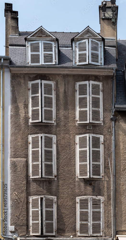 Fototapeta premium old shutter on the facade of old building