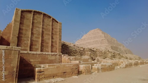 Saqqara, Egypt: Exterior view of the famous Djoser step pyramid in the Sakkara necropolis near Cairo in Egypt is the oldest large pyramid dating to 4500 years. 