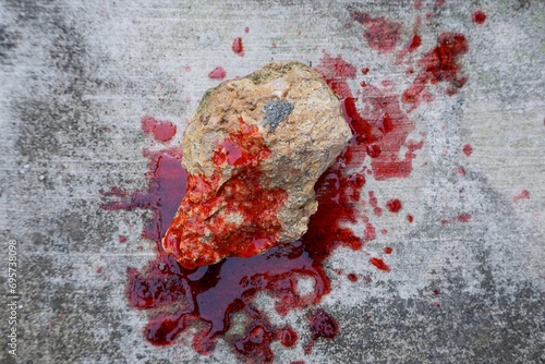 blood spills on the floor. concept photo for illustration of suicide and rock mountain to kill