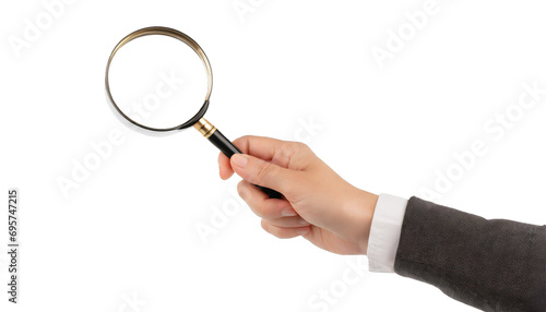Hand holding a magnifying glass - isolated on transparent background