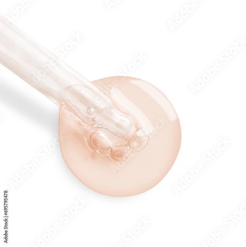 Dropper with serum on white background  top view. Skin care product