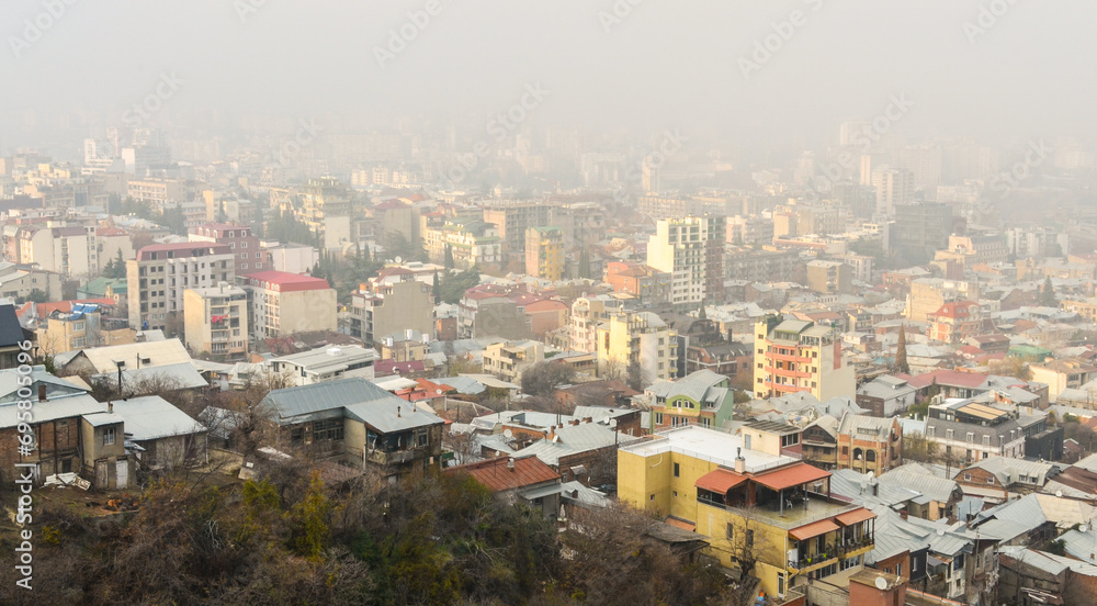 Vake and Vera neighborhoods covered with fog scenic view from Mtatsminda mountain (Tbilisi, Georgia) Vake and Vera neighborhoods covered with fog scenic view from Mtatsminda mountain (Tbilisi, Georgia)