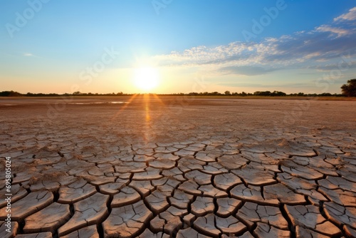 Drought Causes Water Shortage, Resulting In Dry, Cracked Field