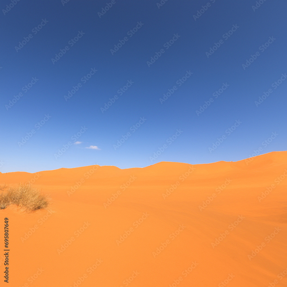 Blue sky with sand dune in desert.