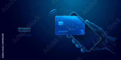 Abstract polygonal bank card on a phone. Online payment and banking. Digital money wallet in blue. Technology and finance concepts. Pay technology background. Futuristic low poly vector illustration. photo