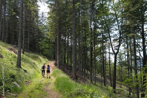 People hiking to Stozek in Beskidy, Poland