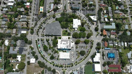 Flight over the roofs of houses, road, bridge, sea, cars, Hollywood, Miami. Filming from a drone.