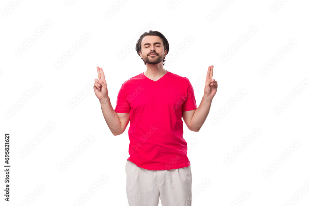 young man dressed in a red t-shirt with a mockup for an identity on a white background young man dressed in a red t-shirt with a mockup for an identity on a white background