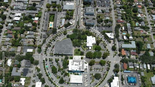 Flight over the roofs of houses, road, bridge, sea, cars, Hollywood, Miami. Filming from a drone.