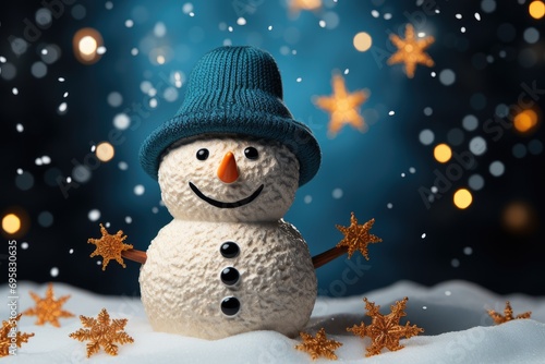 Toy snowman on a blue background with snow and Christmas balls. New Year banner, postcard
