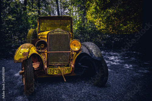 The golden old abandoned car.