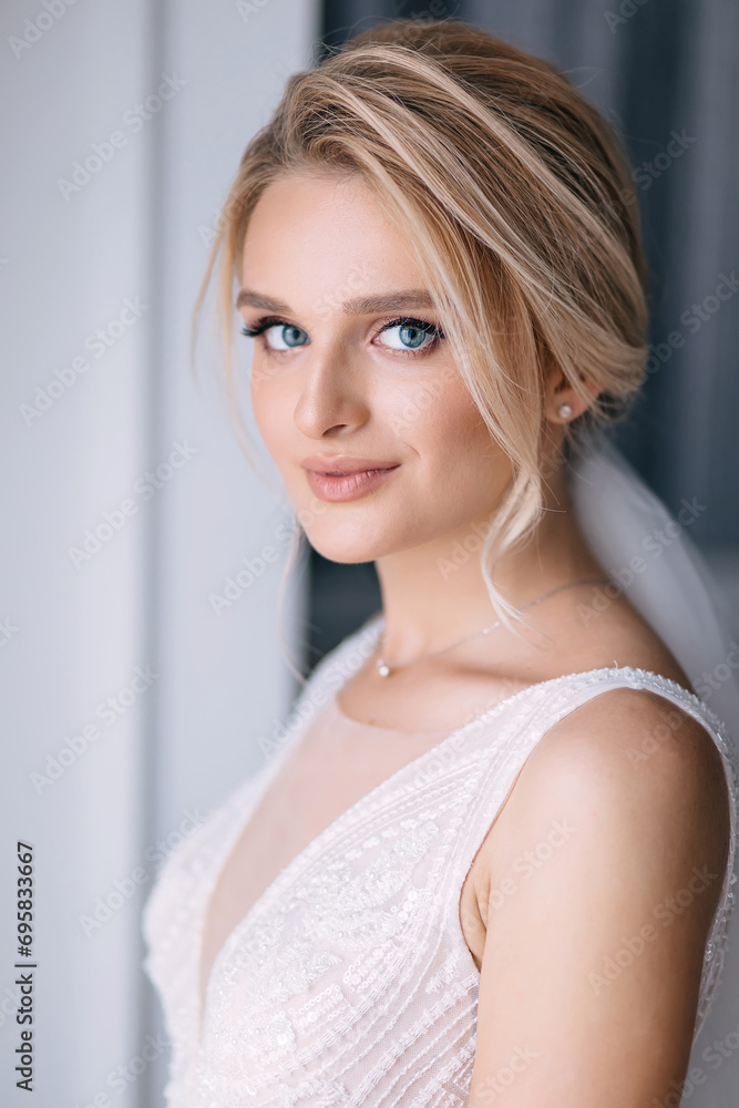 a bride with beautiful makeup with blue eyes and a sweep to smil a bride with beautiful makeup with blue eyes and a sweep to smil