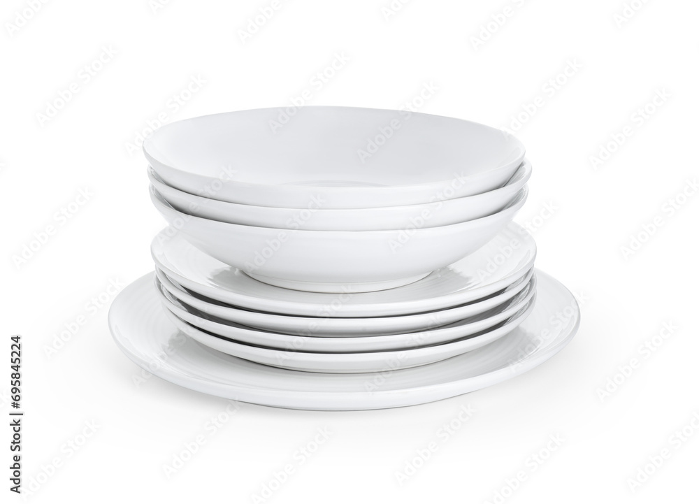 Stack of beautiful ceramic plates and bowls isolated on white Stack of beautiful ceramic plates and bowls isolated on white