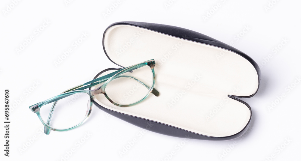 Pair of classics eyeglasses in case isolated on white Pair of classics eyeglasses in case isolated on white