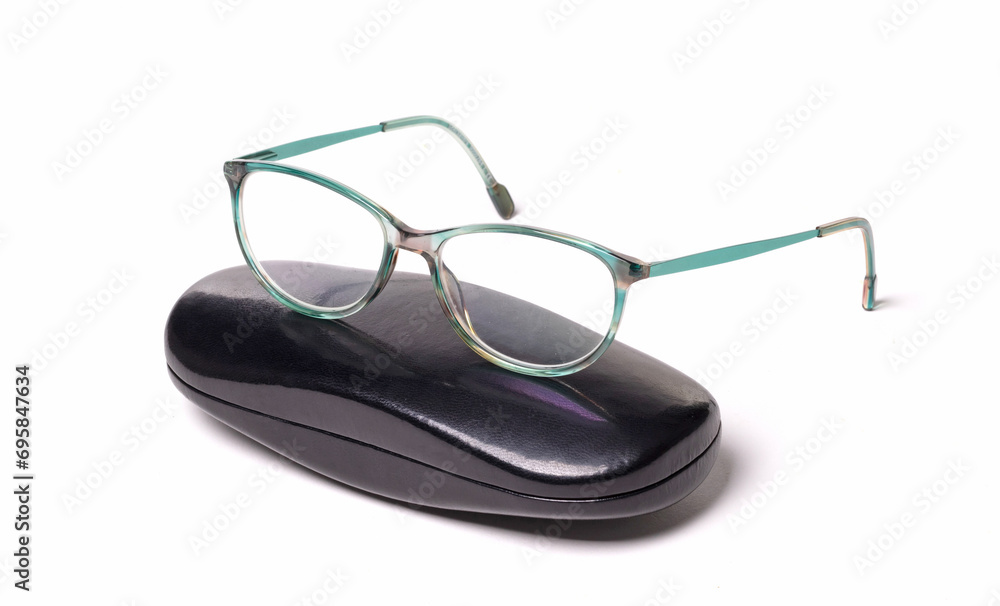 Pair of classics eyeglasses in case isolated on white Pair of classics eyeglasses in case isolated on white
