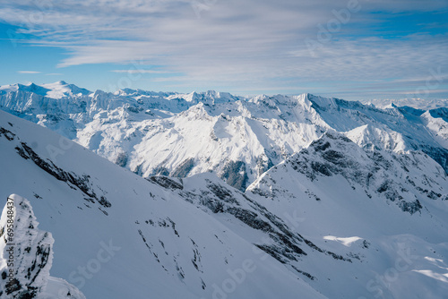 Panoramic view from the Kitzsteinhorn, a snowy mountain, gletsjer and ski area near Kaprun in Salzburg, Austria