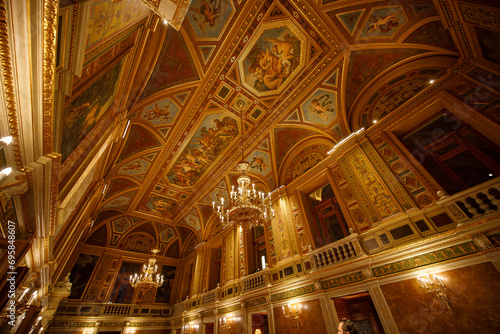 Budapest, Hungary - December 7, 2023: interior wide angle view of the Hungarian State Opera Magyar Állami Operaház architecture.