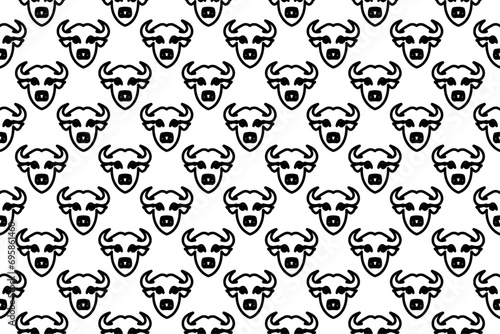 Seamless pattern completely filled with outlines of buffalo head symbols. Elements are evenly spaced. Vector illustration on white background