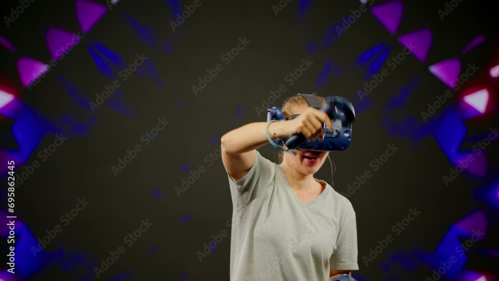 The beautiful woman moves activity in modern virtual reality dance game