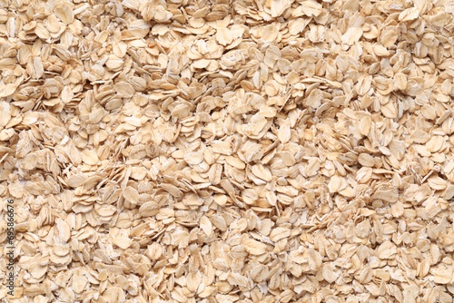 Top view of rolled oats as background