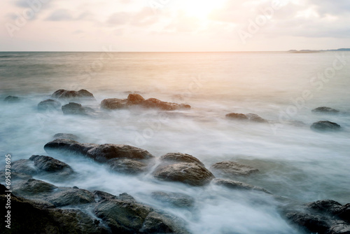 Fototapeta Naklejka Na Ścianę i Meble -  Sunset on the rocky shore.