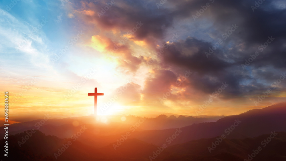 Cross of Jesus Christ on the background of the sunset sky with clouds - obrazy, fototapety, plakaty 