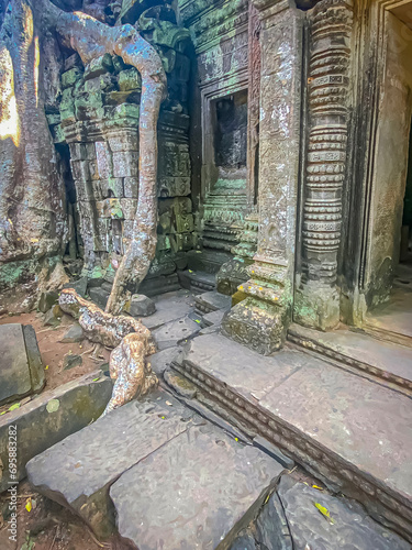 Ta Prohm, a mysterious temple of the Khmer civilization, located on the territory of Angkor in Cambodia photo