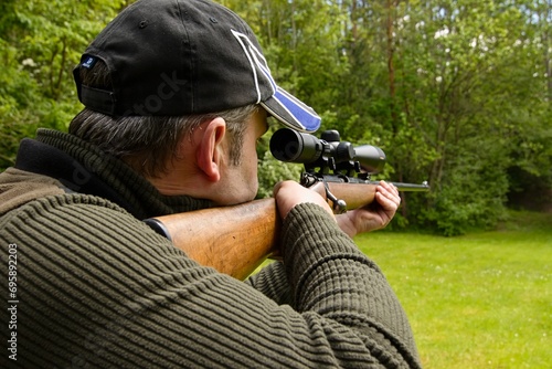 hunters practice shooting with a shotgun